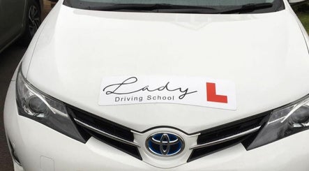 Lady driving school image 2