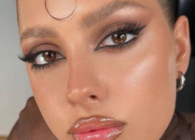 Flawless makeup close-up at Ella’s Beauty, London, England, GB. Highlighting expert eyeliner and glossy lips.