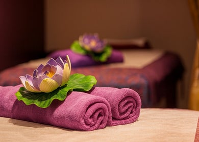Purple towels and lotus flower at Pailin Thai Wellness, South Yarra, Victoria, AU.