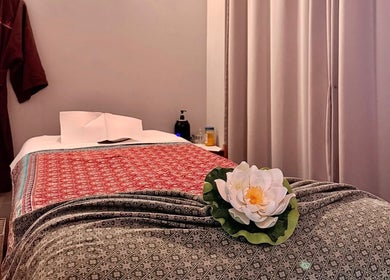 Tranquil massage room at Pailin Thai Wellness in South Yarra, Victoria, AU, featuring elegant decor and soft lighting.