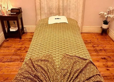 Calm massage room at Oriental Aroma Thai Massage, Malvern East, Victoria, AU, featuring a comfortable treatment bed.