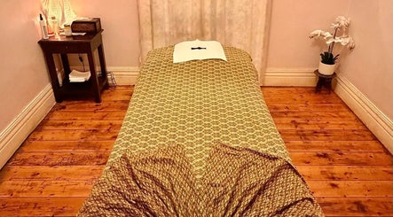 Calm massage room at Oriental Aroma Thai Massage, Malvern East, Victoria, AU, featuring a comfortable treatment bed.