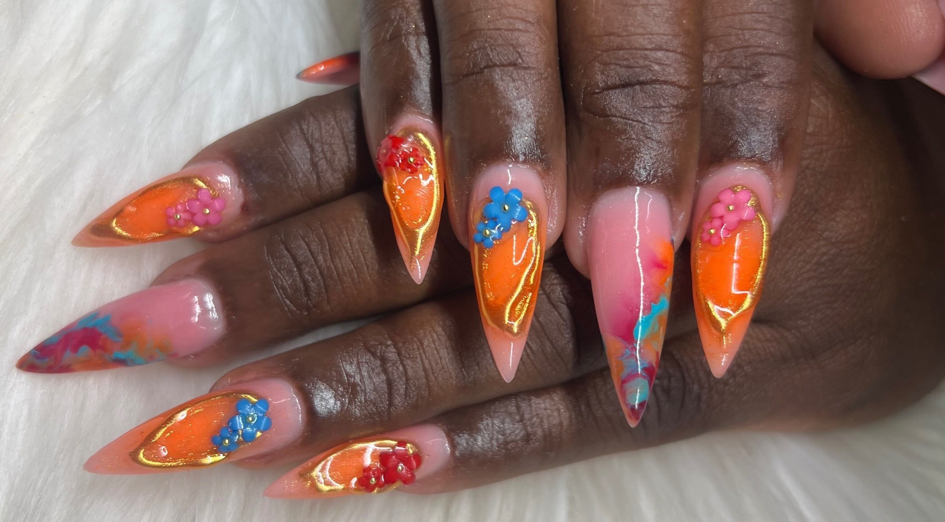 Vibrant floral nail art at The Nail & Lash Studio, Saint Philip, BB. Showcases exquisite design on manicured nails.