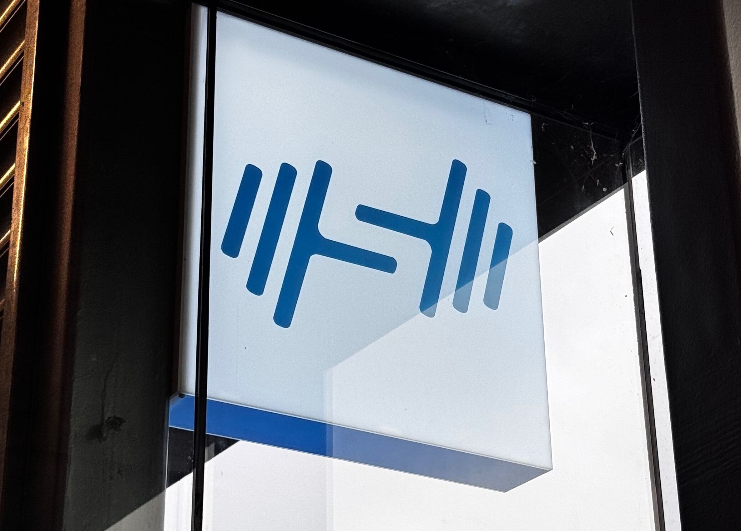 Salus Strength logo on a window, Auckland, Auckland, NZ, showcasing fitness and wellness.