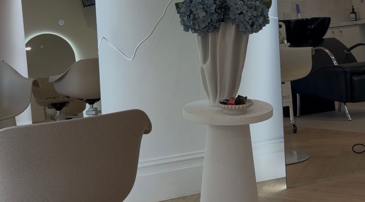 Elegant seating and decor at SALON SARAH, Melbourne, Victoria, AU creating a peaceful spa atmosphere.