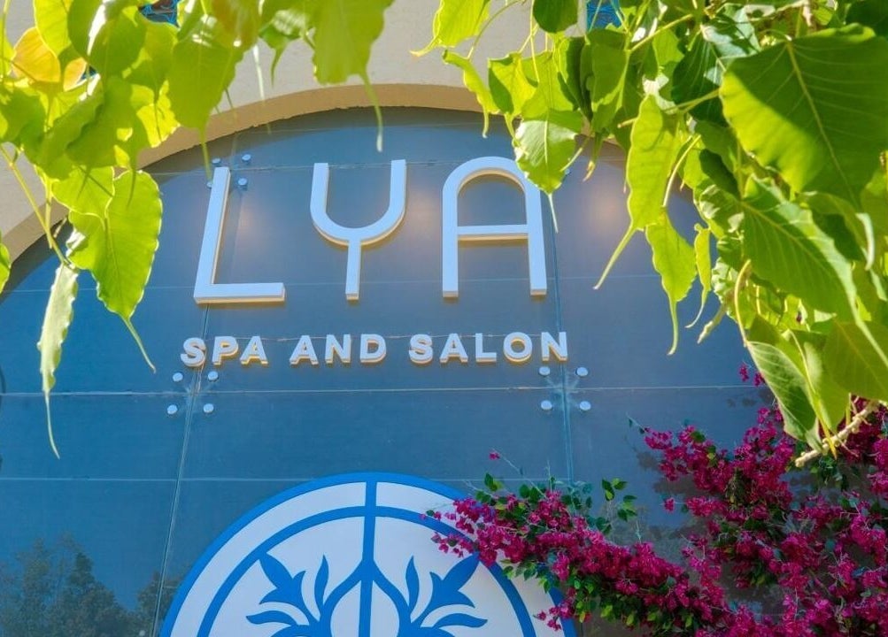 Front view of LYA Spa & Salon with vibrant greenery, located in Riyadh, Riyadh Province, SA.