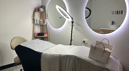 Serene treatment room at Ivory Rose Cosmetics, Maroochydore, Queensland, AU, featuring modern decor and lighting.