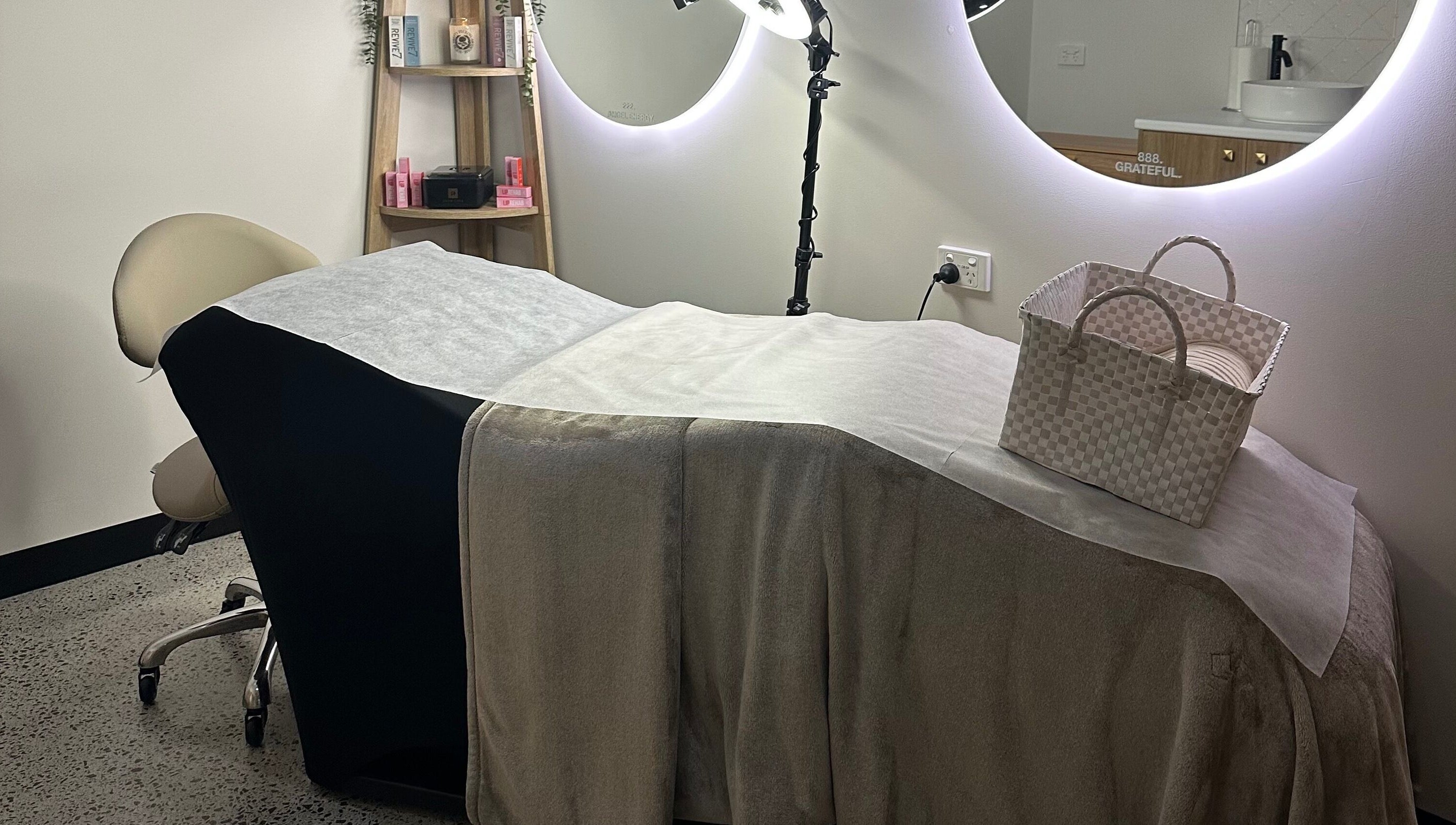 Luxurious treatment room at Ivory Rose Cosmetics in Maroochydore, Queensland, AU, featuring a comfortable spa bed.