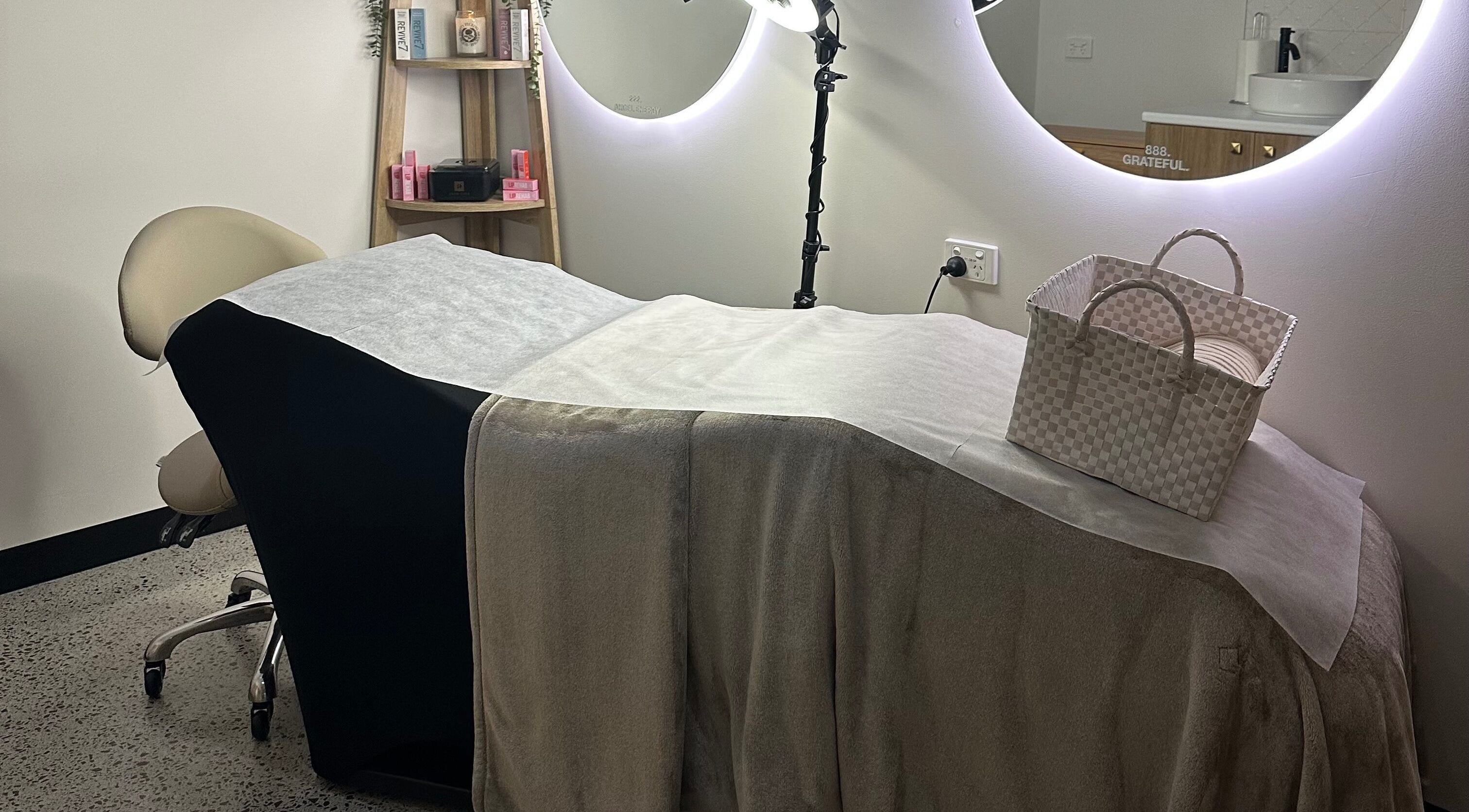 Luxurious treatment room at Ivory Rose Cosmetics in Maroochydore, Queensland, AU, featuring a comfortable spa bed.