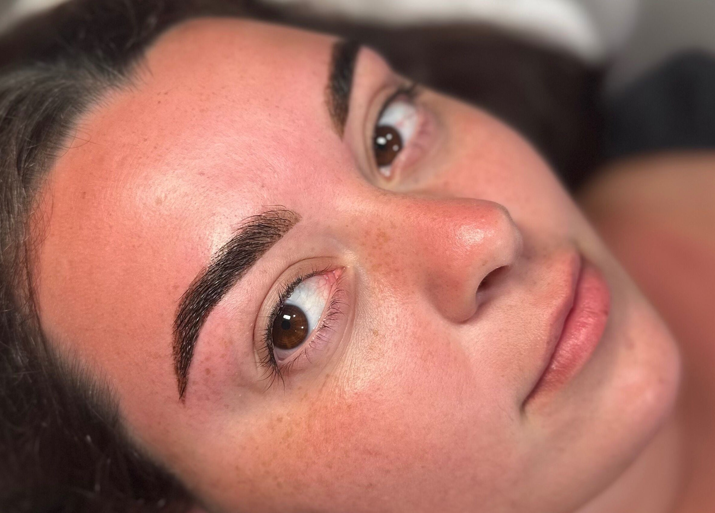 Close-up of beautifully shaped eyebrows at Ivory Rose Cosmetics, Maroochydore, Queensland, AU.