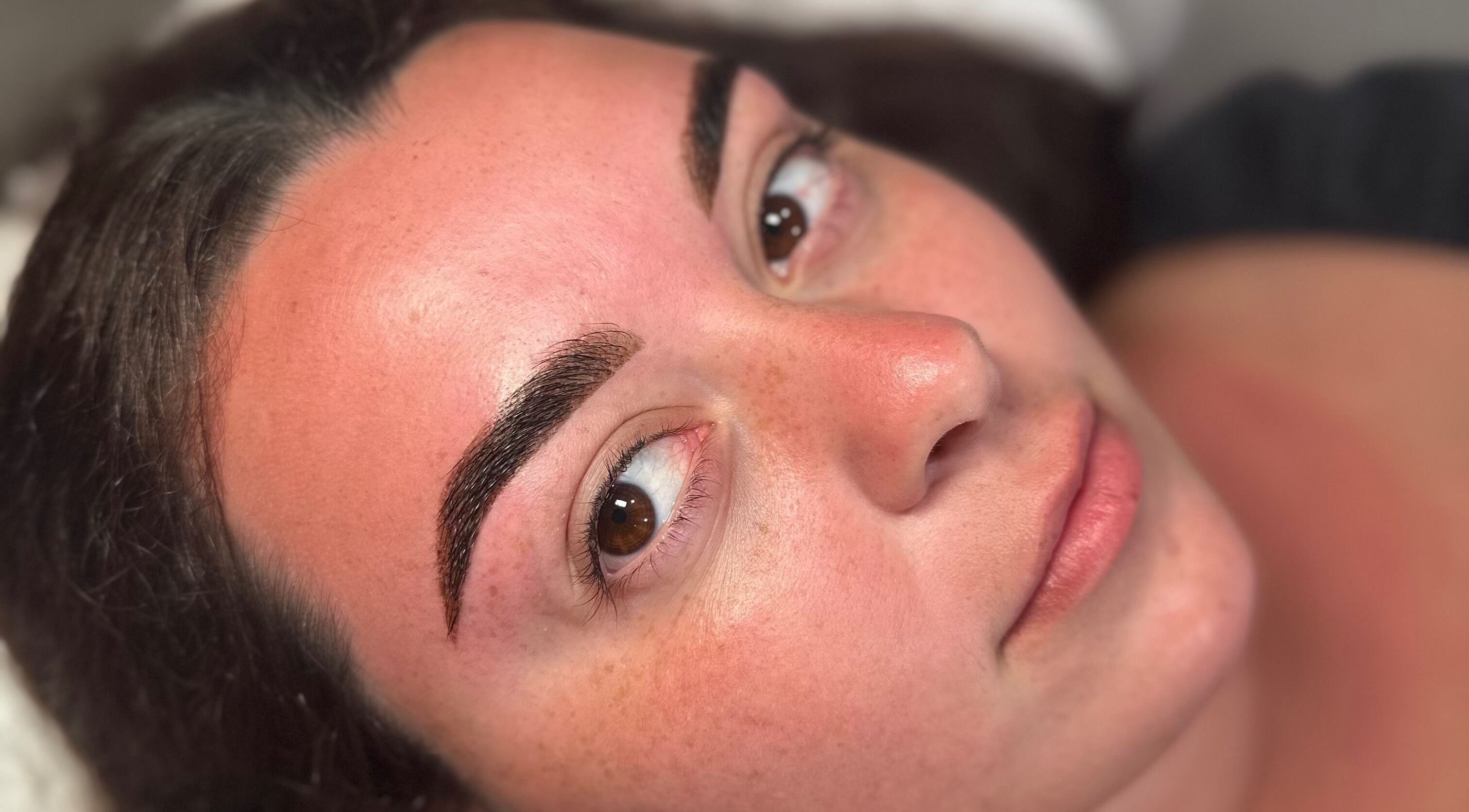 Close-up of beautifully shaped eyebrows at Ivory Rose Cosmetics, Maroochydore, Queensland, AU.