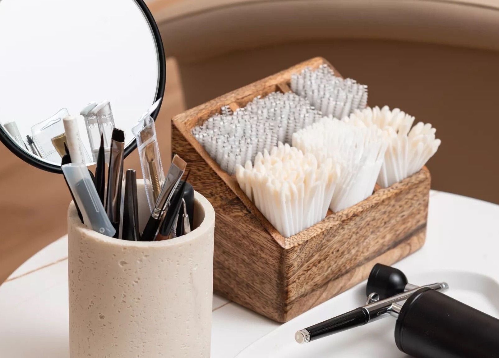 Beauty tools and brushes at Annaflex, London, England, GB, showcasing professionalism and style.