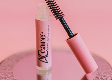 Pink brow serum by Amanda Corrêa - ACBrows & Beauty in Dublin, County Dublin, IE, displayed on a reflective surface.