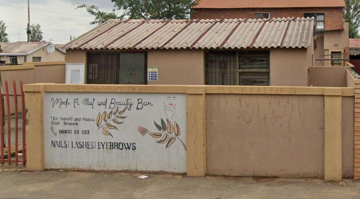 Exterior of Modi Fi Nail And Beauty Bar in Soweto, Gauteng, ZA, showcasing modern, welcoming design.