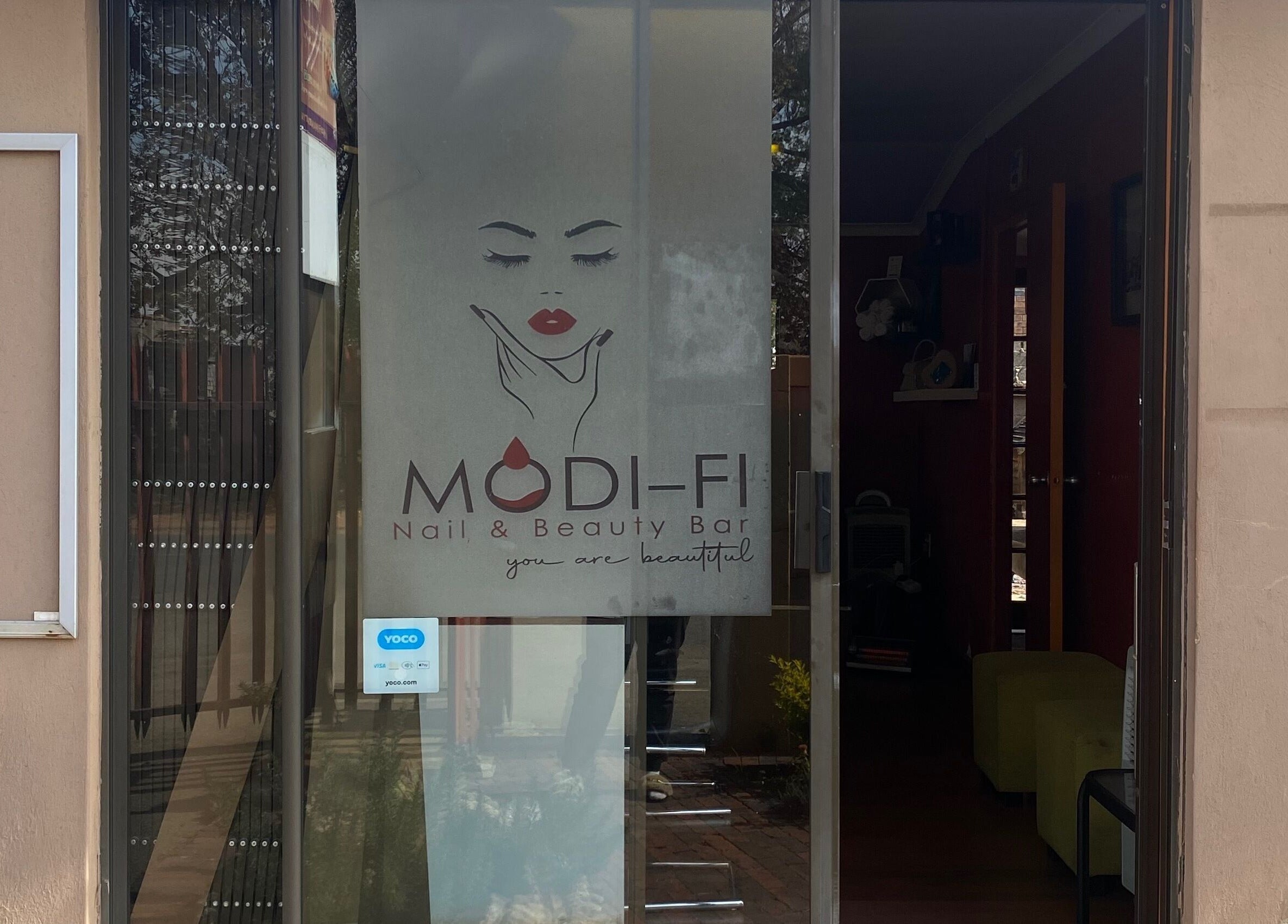 Entrance of Modi Fi Nail And Beauty Bar in Soweto, Gauteng, ZA with elegant signage.