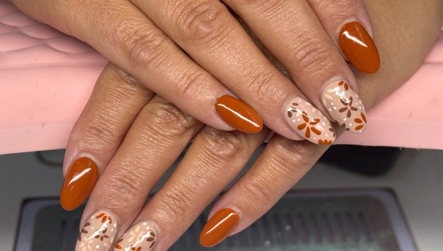 Fall-inspired floral nail art at Nails by Georgia in Colne, England, GB showcasing intricate designs.