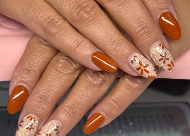 Fall-inspired floral nail art at Nails by Georgia in Colne, England, GB showcasing intricate designs.
