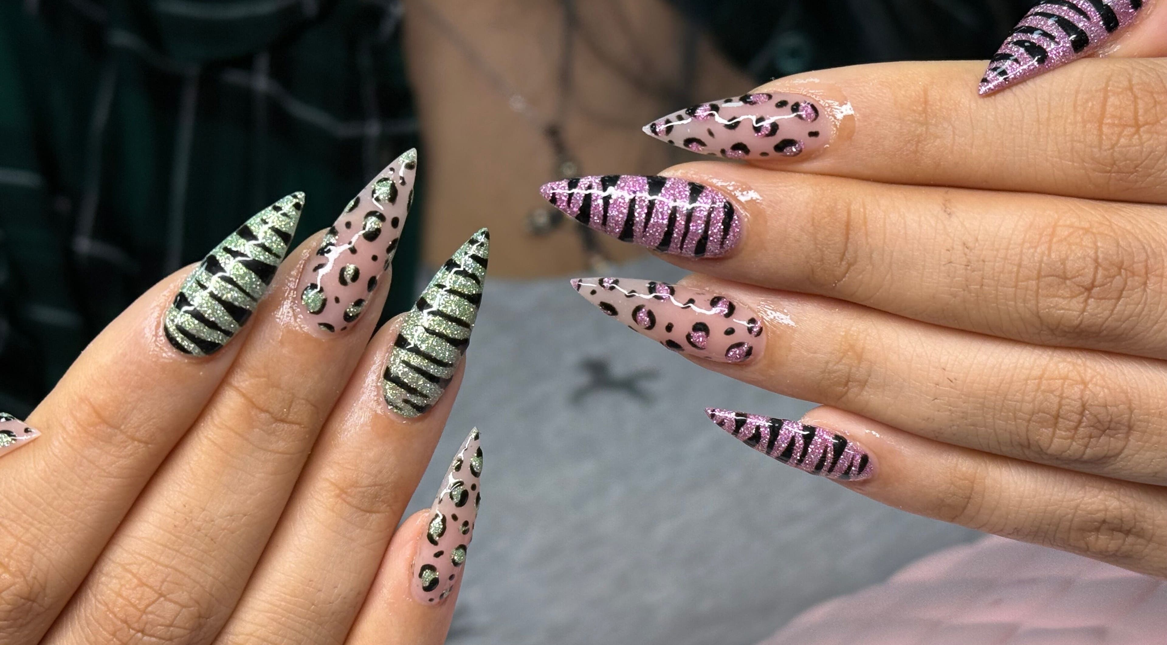 Edgy animal print nail art by Nails by Georgia Eb in Colne, England, GB. Perfectly executed pink and green stripes.