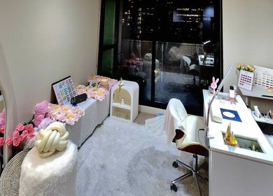 Elegant nail salon interior at NailxSejal in Melbourne, Victoria, AU, featuring stylish decor and manicure stations.