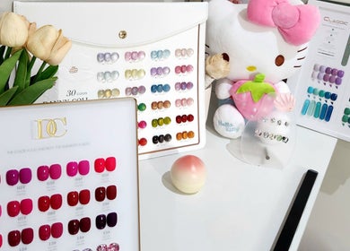 Nail polish color displays at NailxSejal, Melbourne, Victoria, AU, showcasing vibrant shades and designs.