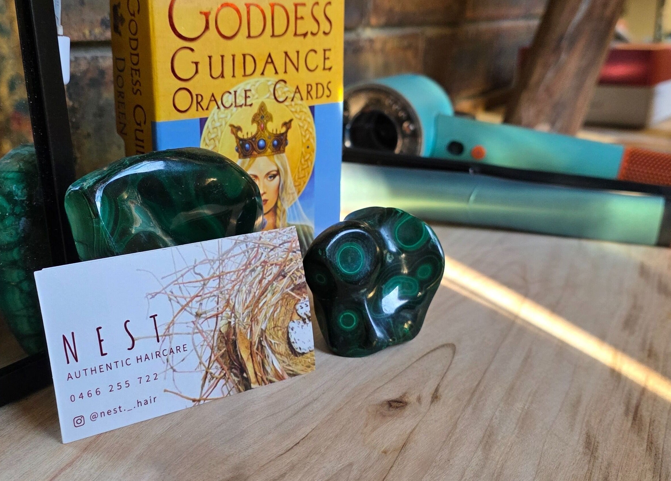 Elegant Nest Hair decor at Shailer Park, Queensland, AU featuring oracle cards and styling tools.