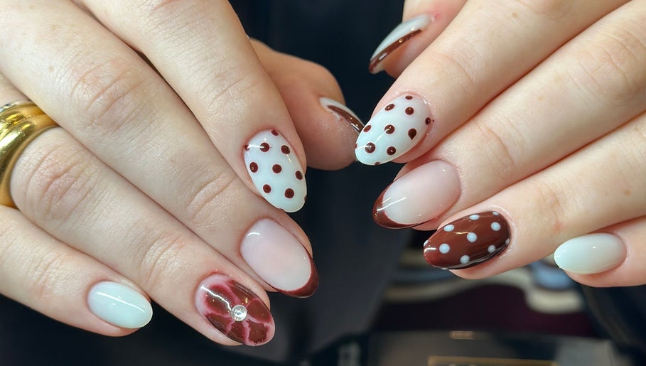Brown and white polka dot nail art at The Lux Cocoon Sands Beauty Lounge, Torquay, Victoria, AU.