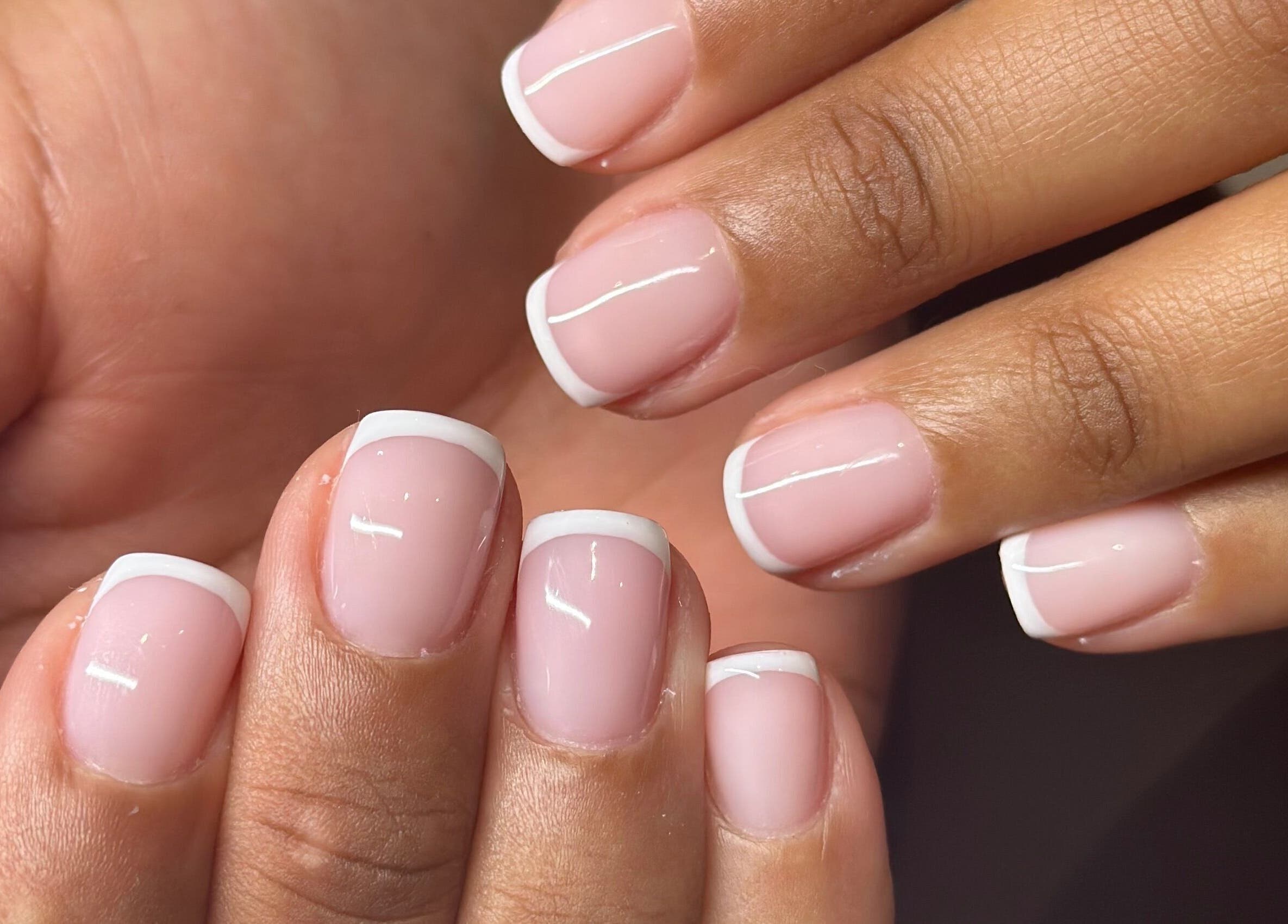 Elegant French manicure at The Lux Cocoon, Newtown, Victoria, AU, showcasing stunning nail art.