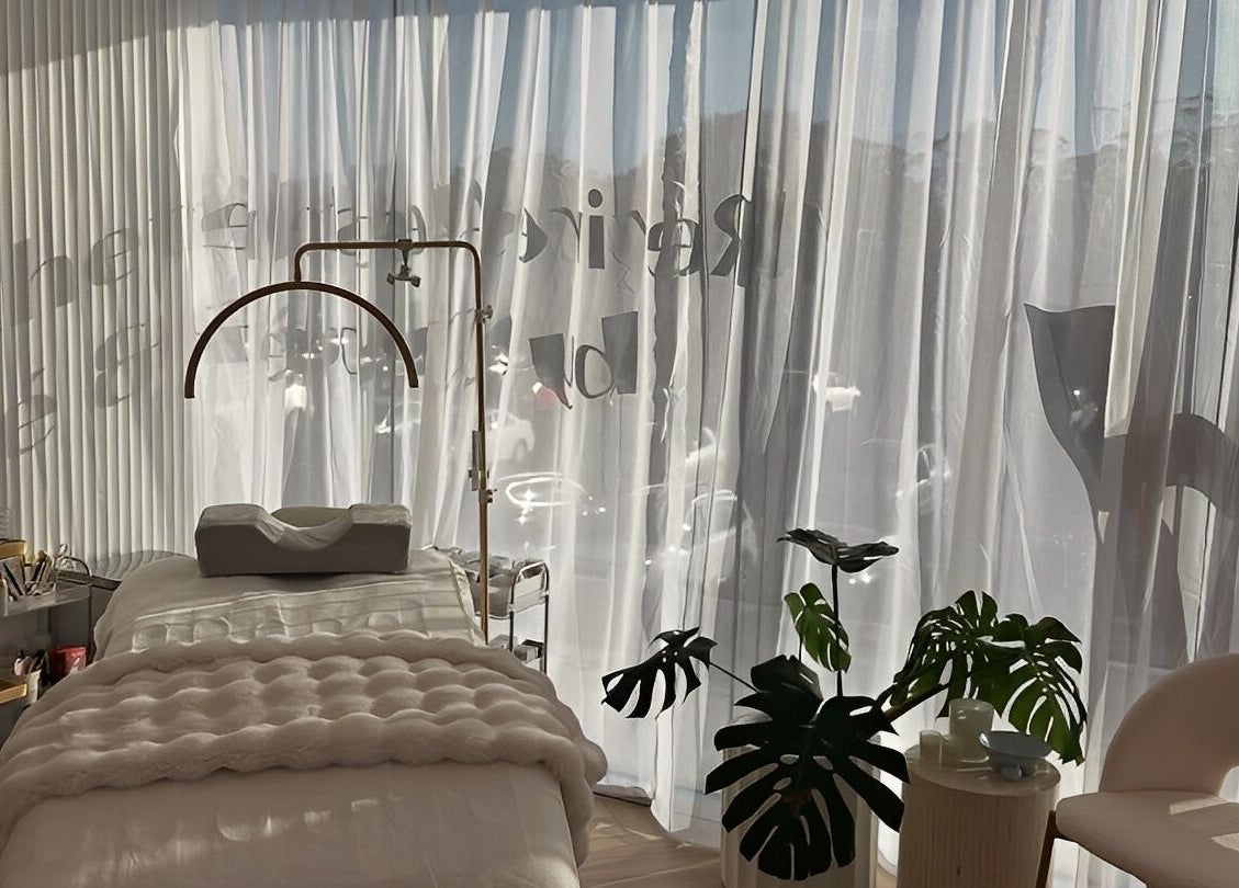 Elegant treatment room at The Lux Cocoon, Newtown, Victoria, AU, featuring soft light and lush decor.