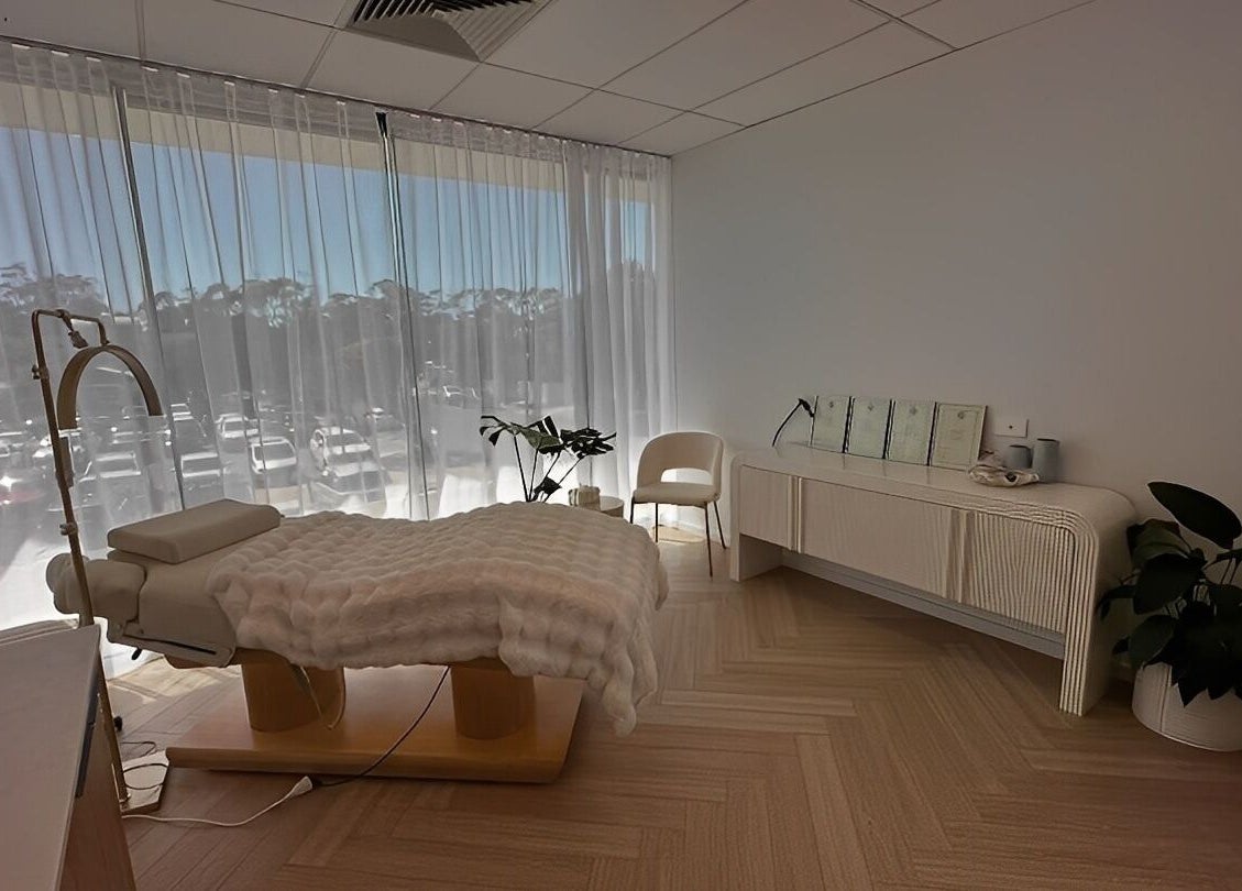 Therapy room at The Lux Cocoon, Newtown, Victoria, AU with plush treatment bed and soft lighting.
