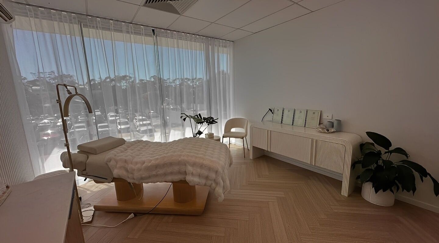 Therapy room at The Lux Cocoon, Newtown, Victoria, AU with plush treatment bed and soft lighting.