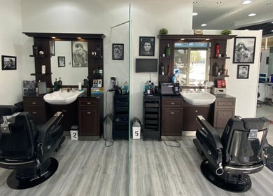 Interior view of Nazih Gents Salon - Sharjah showcasing sleek barber chairs and stylish decor in Sharjah, Sharjah, AE.