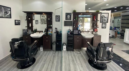 Interior view of Nazih Gents Salon - Sharjah showcasing sleek barber chairs and stylish decor in Sharjah, Sharjah, AE.
