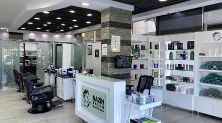 Modern interior of Nazih Gents Salon - Sharjah, showcasing stylish decor and grooming stations. Located in Sharjah, AE.