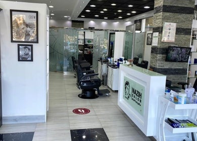 Interior of Nazih Gents Salon - Sharjah, featuring sleek barber chairs and contemporary decor, located in Sharjah, AE.