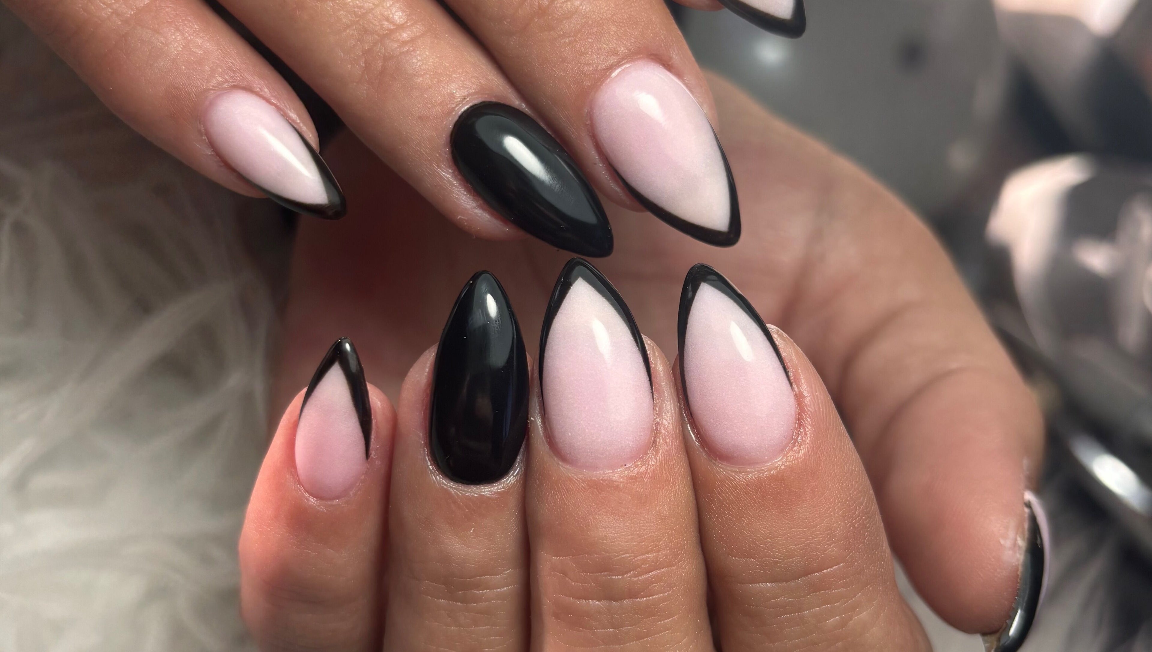 Stylish black and pink stiletto nails at Beauty by Cherise, Cape Town, Western Cape, ZA.