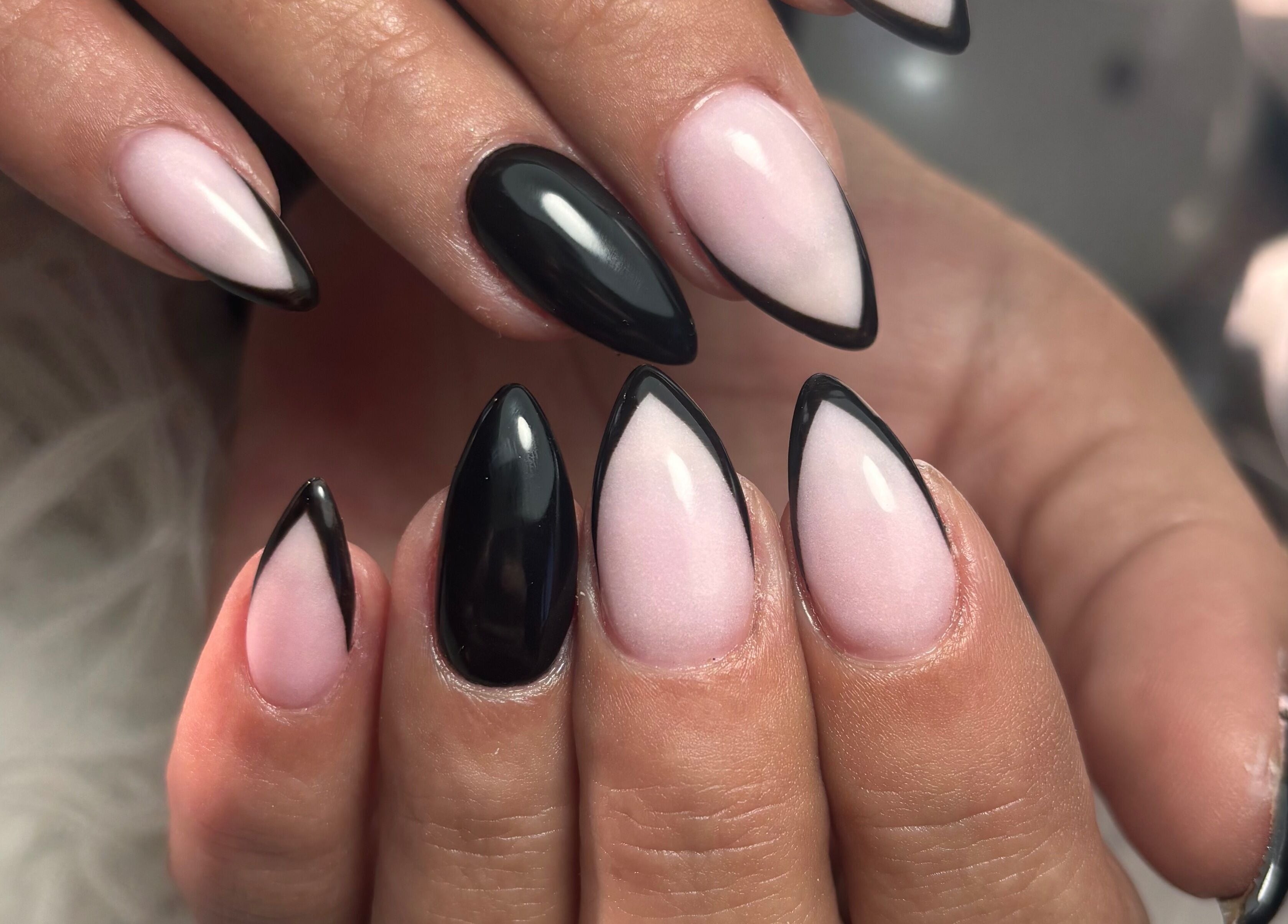 Stylish black and pink stiletto nails at Beauty by Cherise, Cape Town, Western Cape, ZA.