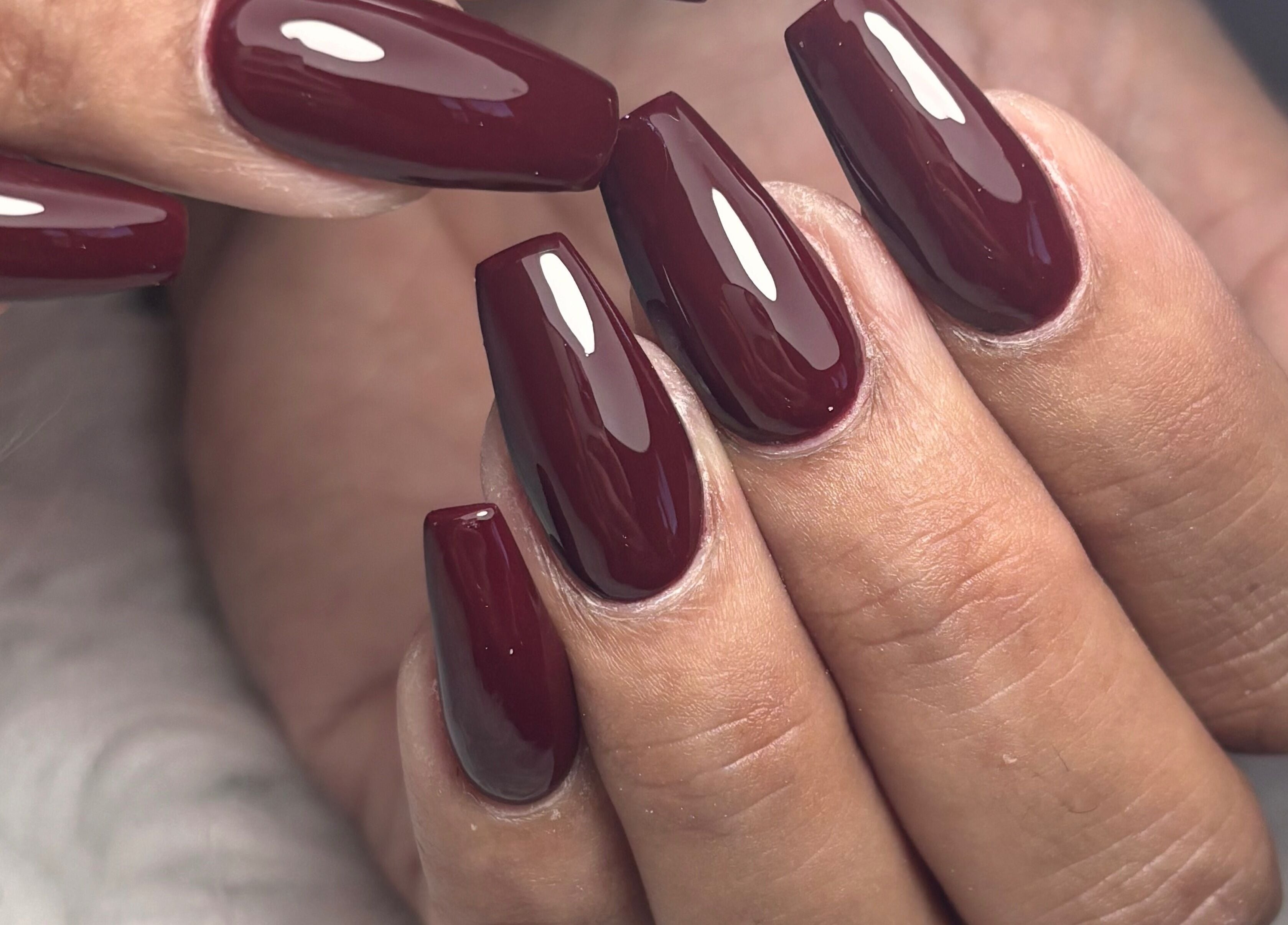 Rich burgundy nail design at Beauty by Cherise, Cape Town, Western Cape, ZA. Perfect for elegant occasions.