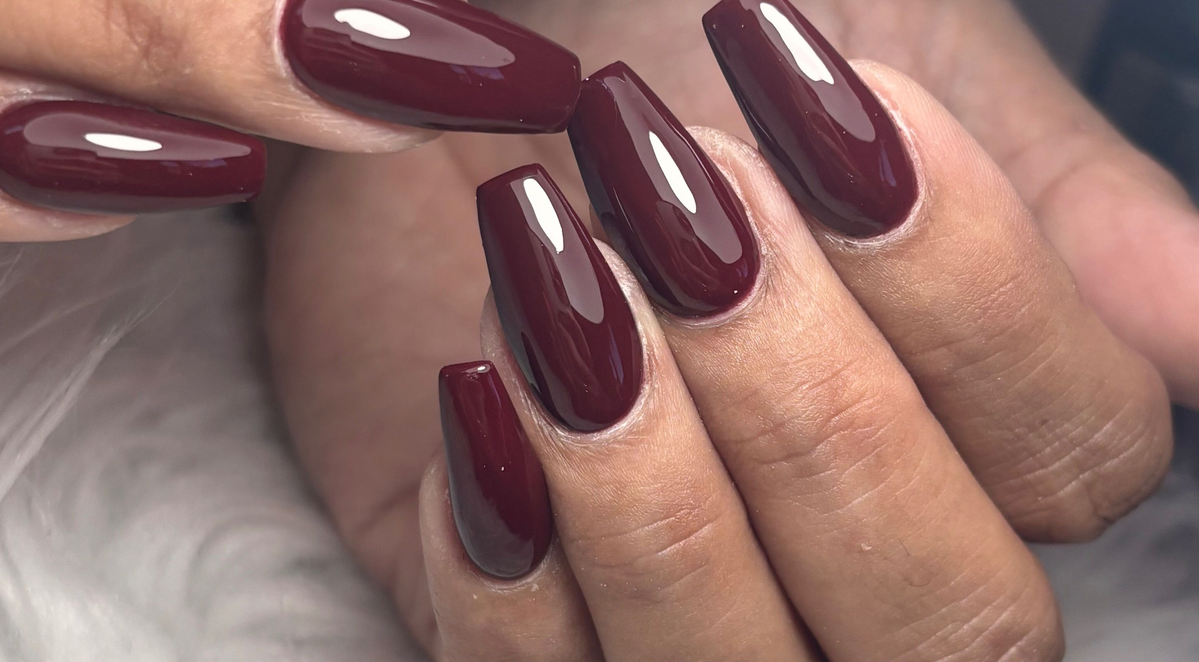 Rich burgundy nail design at Beauty by Cherise, Cape Town, Western Cape, ZA. Perfect for elegant occasions.