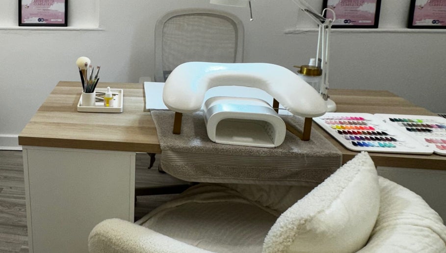 Nail salon setup at Glossy by Nieve, Hartlepool. Features nail tools and color samples.