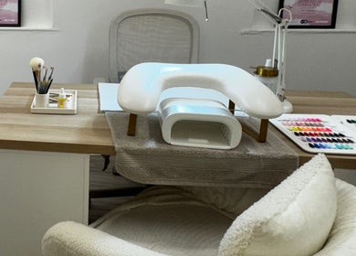 Nail salon setup at Glossy by Nieve, Hartlepool. Features nail tools and color samples.