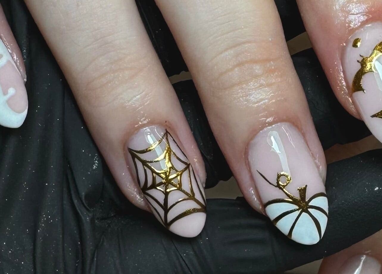 Halloween-themed nail art at Glossy by Nieve, Hartlepool, England, GB with ghosts and spiders.