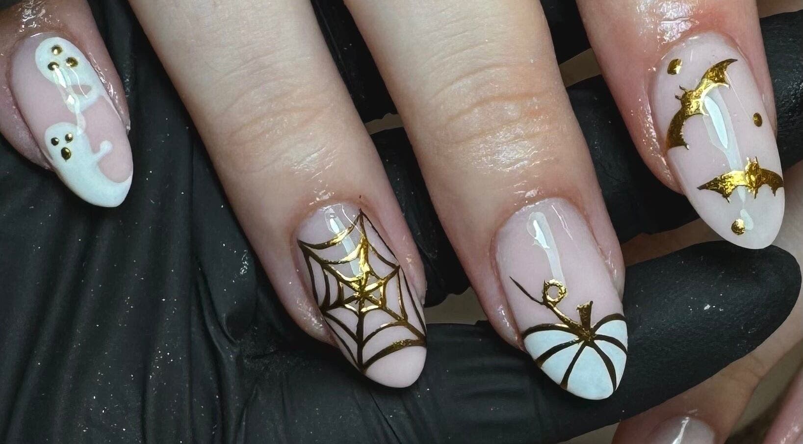 Halloween-themed nail art at Glossy by Nieve, Hartlepool, England, GB with ghosts and spiders.