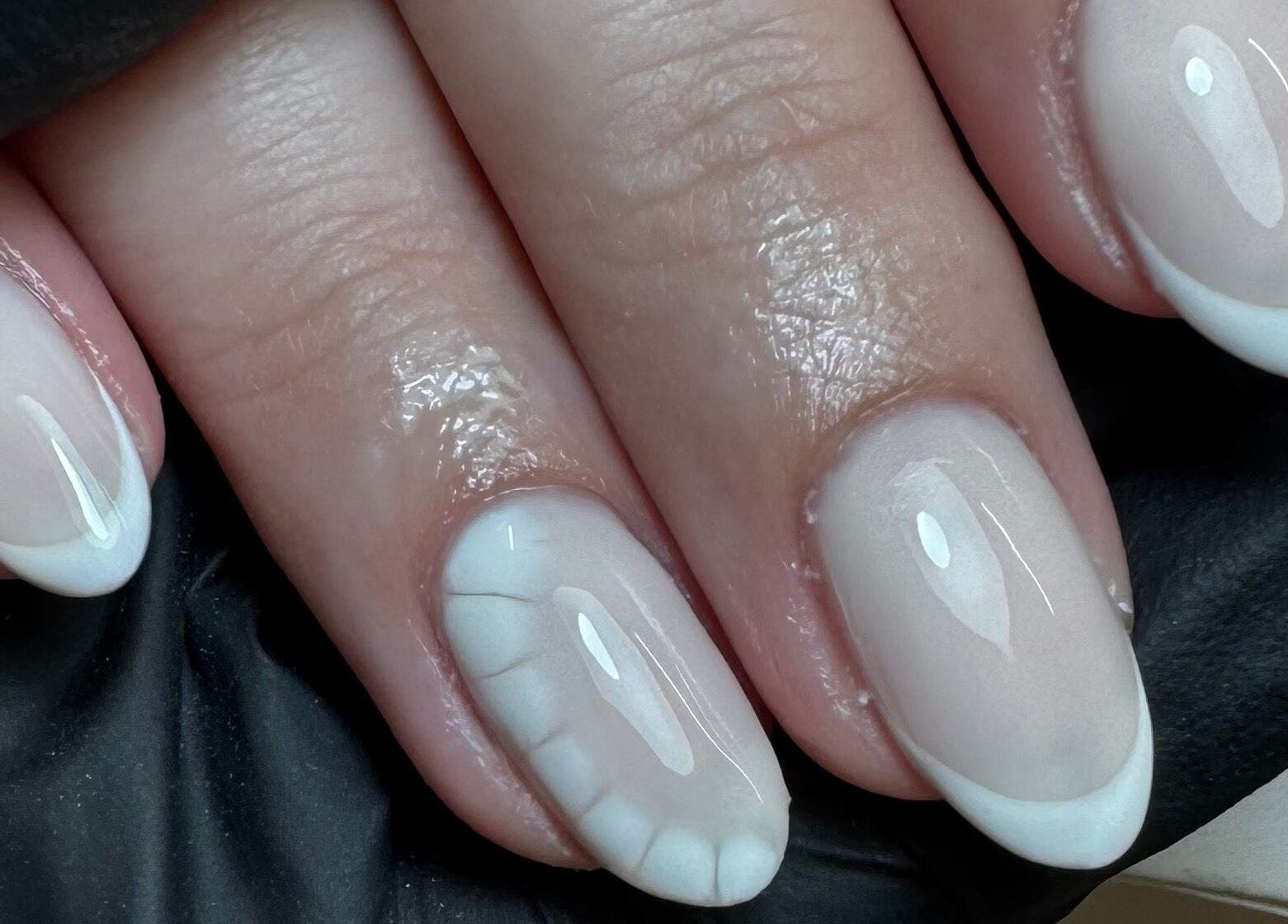 Elegant French manicure at Glossy by Nieve, Hartlepool, England, GB, showcasing perfect nail art style.