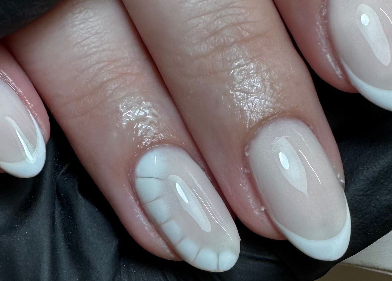 Elegant French manicure at Glossy by Nieve, Hartlepool, England, GB showcasing glossy white tips.