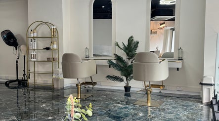 Elegant salon chairs at Lewa Studios, Birmingham, England, GB, showcasing modern beauty space.