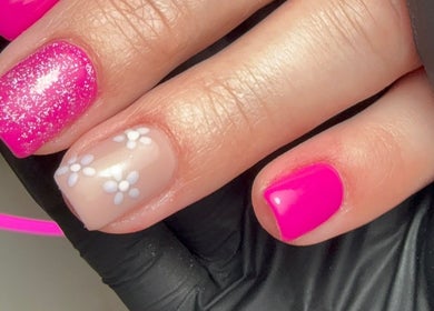 Stunning pink nails with floral design at CXM Nails, Bangor, Northern Ireland, GB.