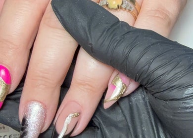 Glamorous nail art at CXM Nails, Bangor, Northern Ireland, GB, showcasing vibrant colors and intricate designs.