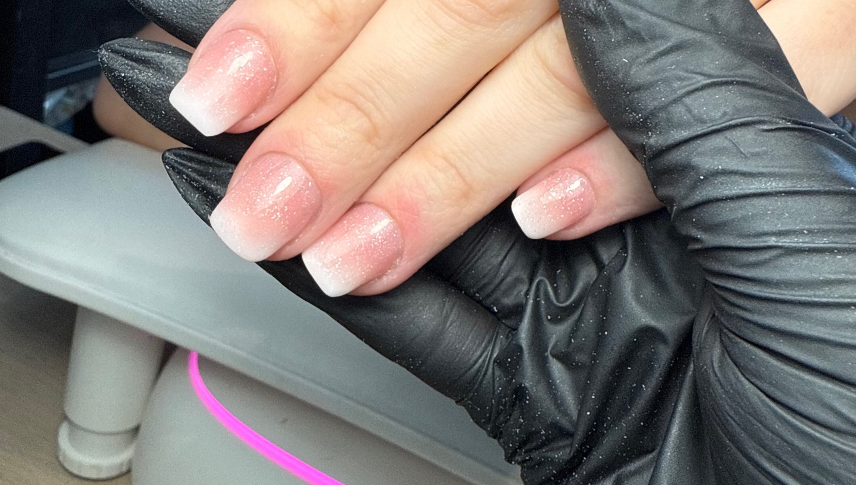 Elegant glitter ombre nails at CXM Nails, Bangor, Northern Ireland, GB. Perfect for a chic manicure.