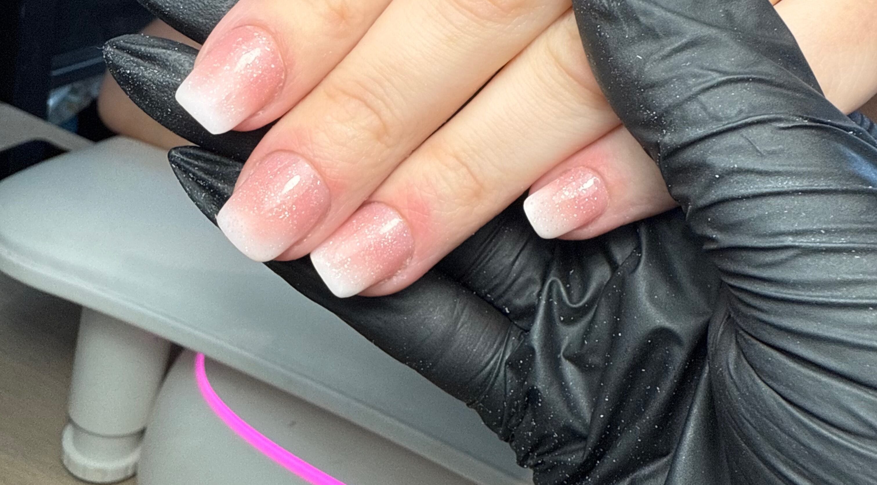 Elegant glitter ombre nails at CXM Nails, Bangor, Northern Ireland, GB. Perfect for a chic manicure.