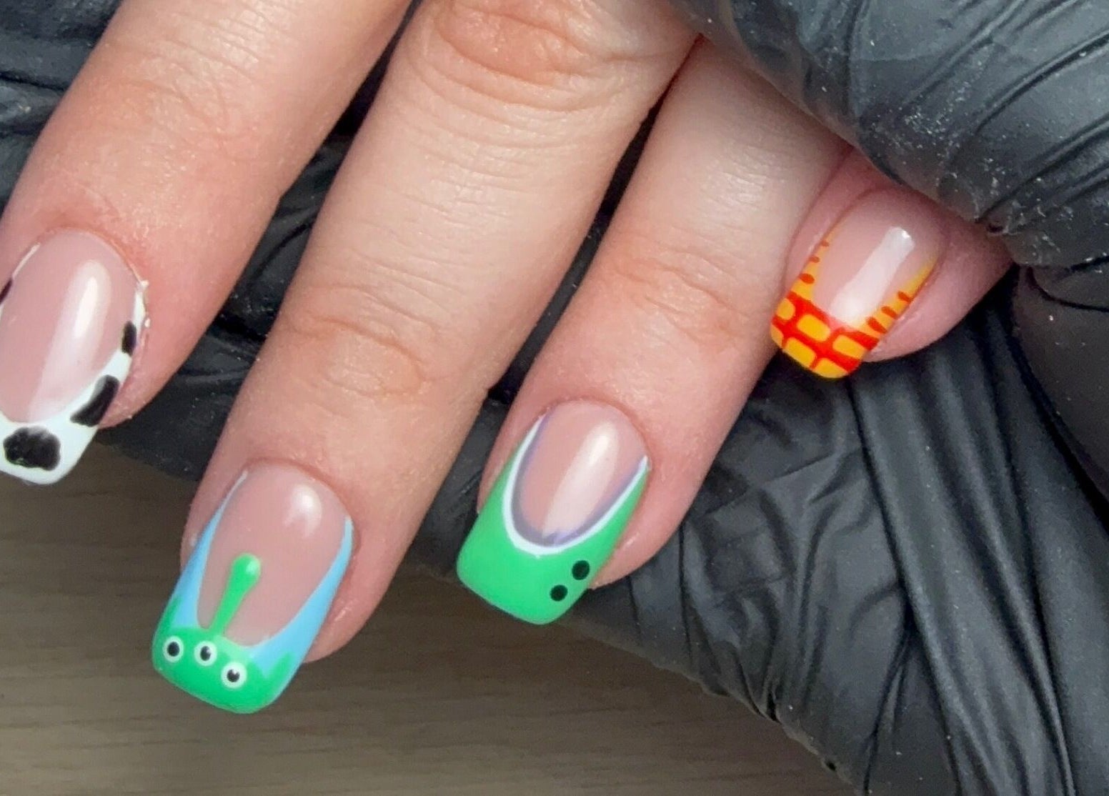 Creative nail art at CXM Nails, Bangor, Northern Ireland, GB, showcasing colorful and unique designs.